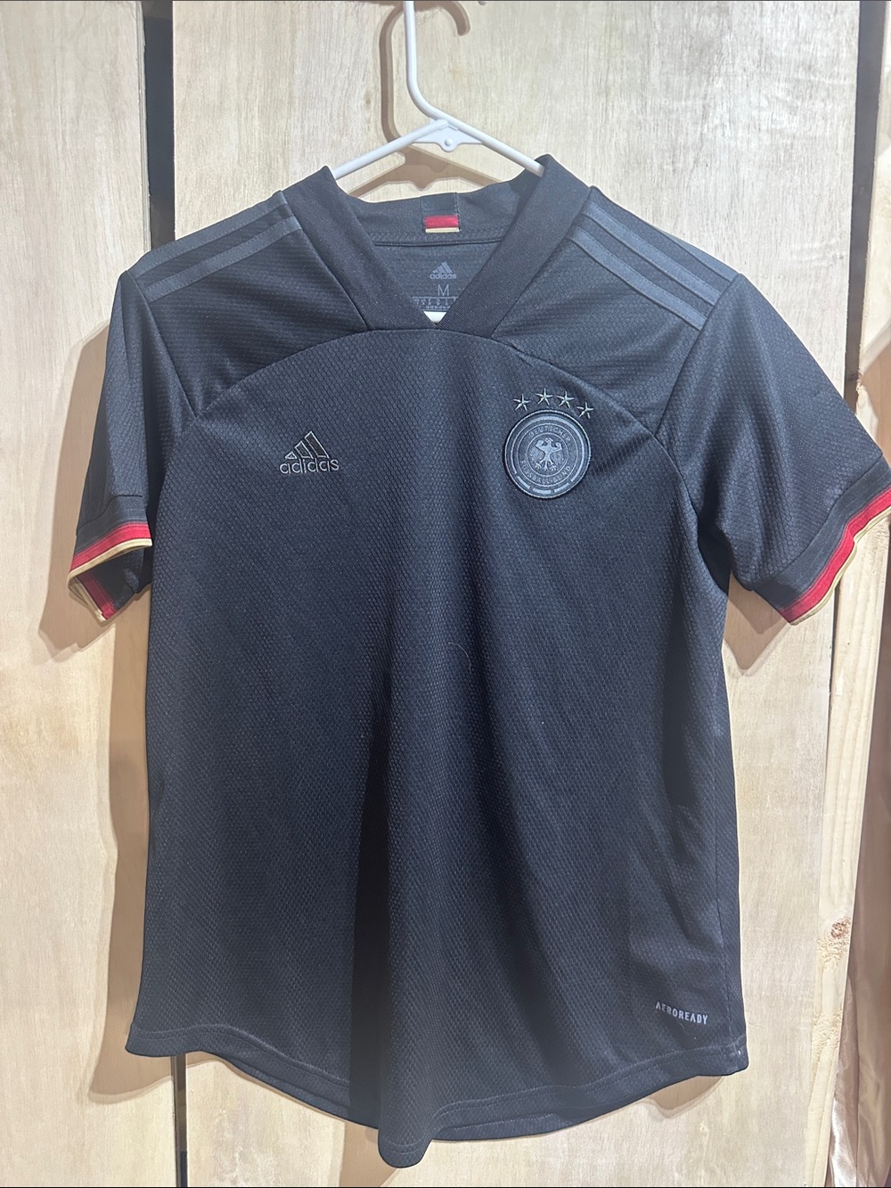 adidas Black Men’s Germany Football Jersey with Red & Gold Sleeve Accents 0075
